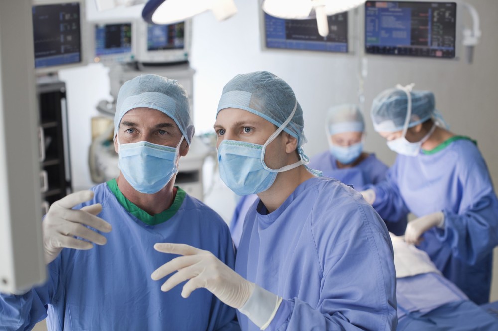 Doctors discussing in operating room